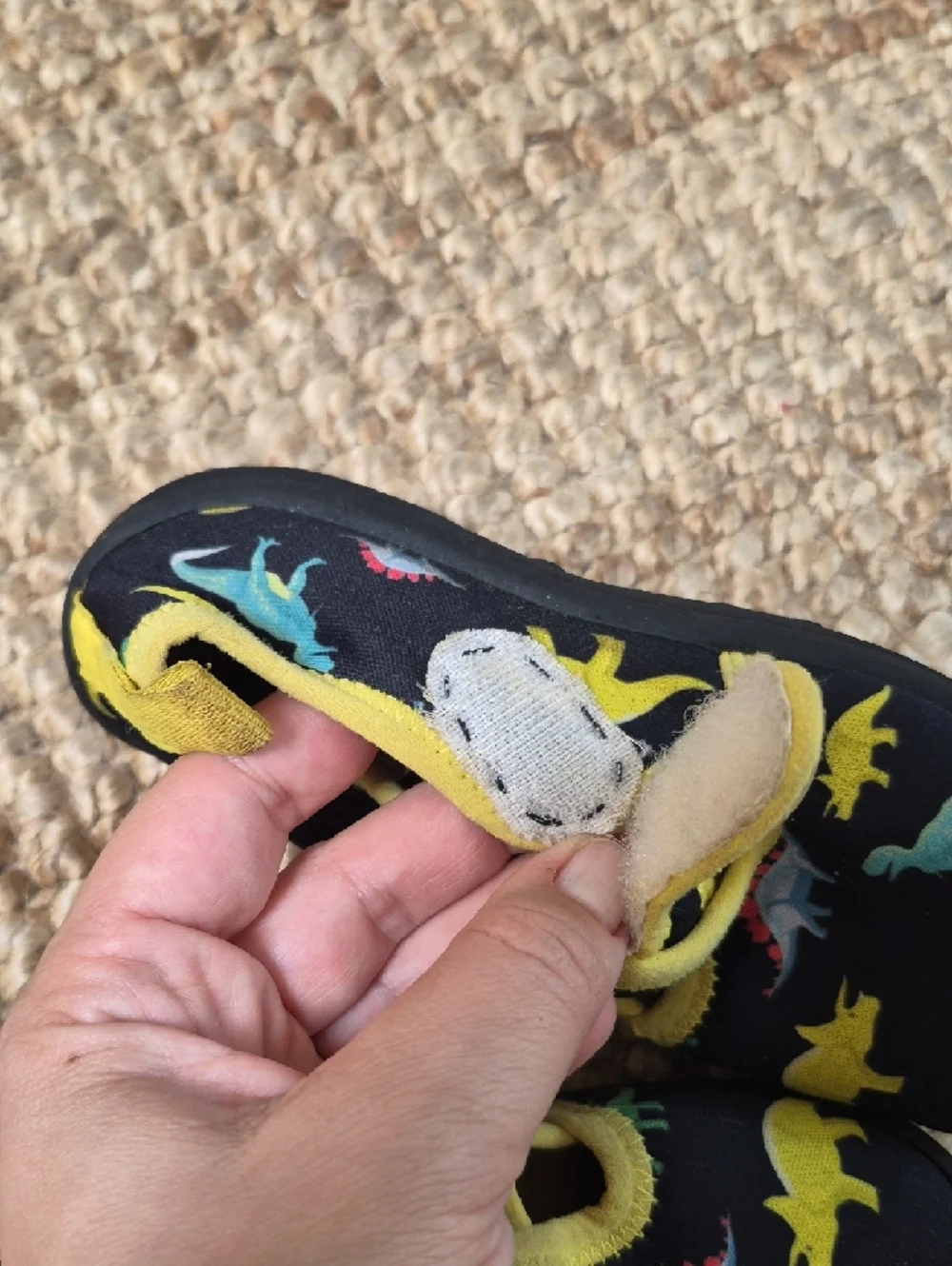 Toddler's dinosaur print water shoes are from the brand Nerteo. 10 Water Shoes